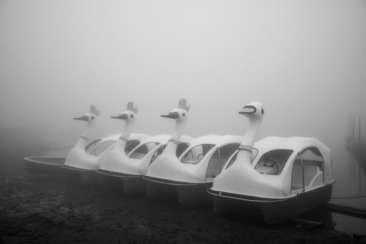 an old and faded Japanese tourist spot in the fog