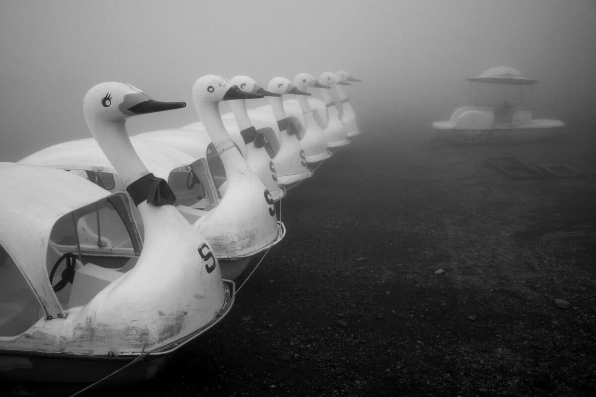 an old and faded Japanese tourist spot in the fog