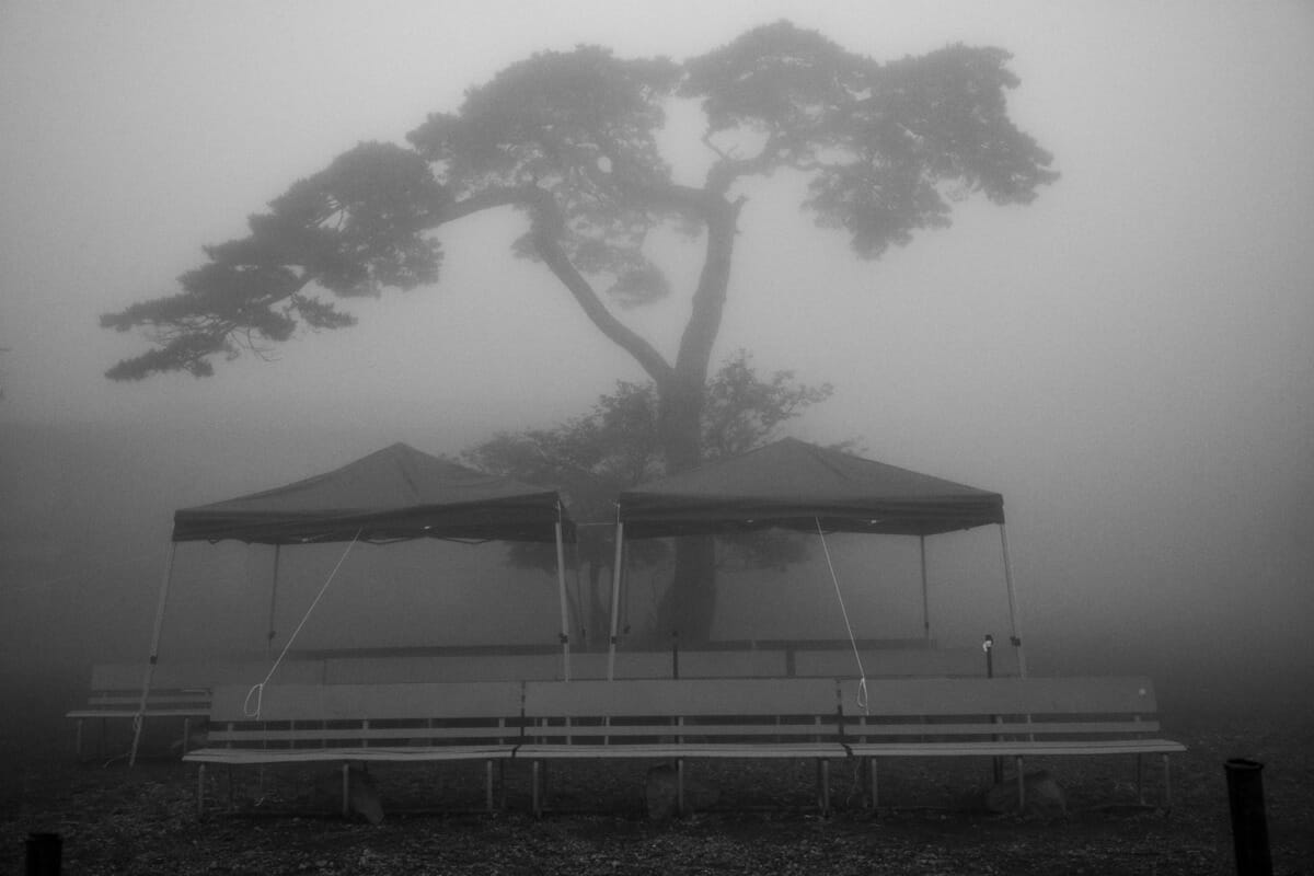 an old and faded Japanese tourist spot in the fog