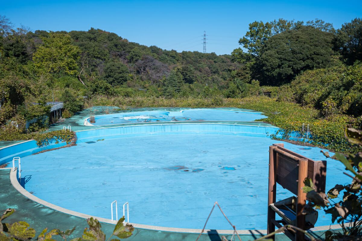 An abandoned and overgrown Japanese theme park