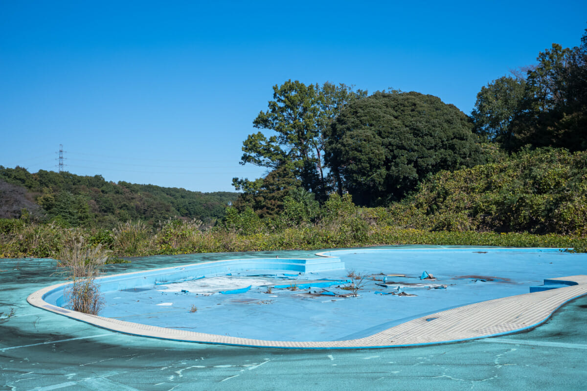 An abandoned and overgrown Japanese theme park