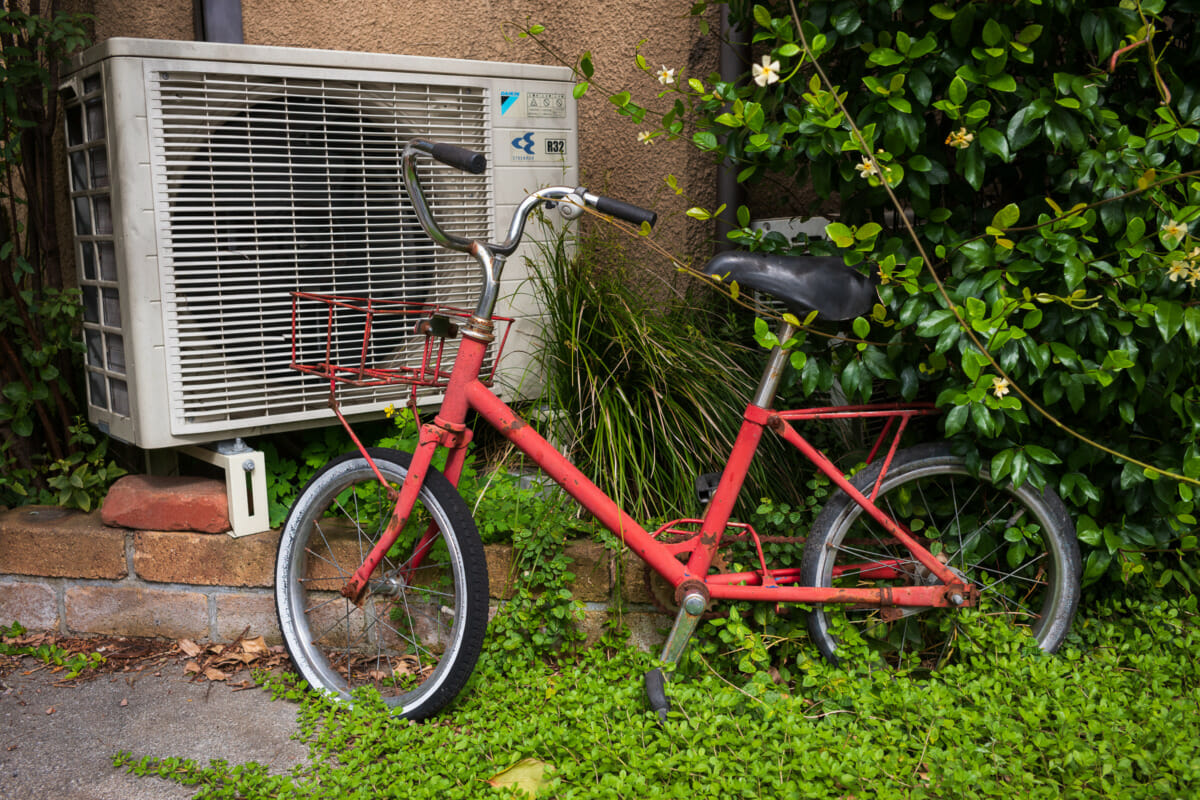 Abandoned and overgrown Tokyo bicycles