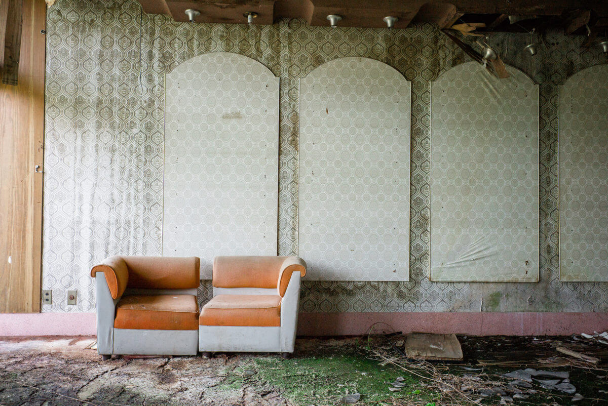 abandoned and overgrown japanese hotel