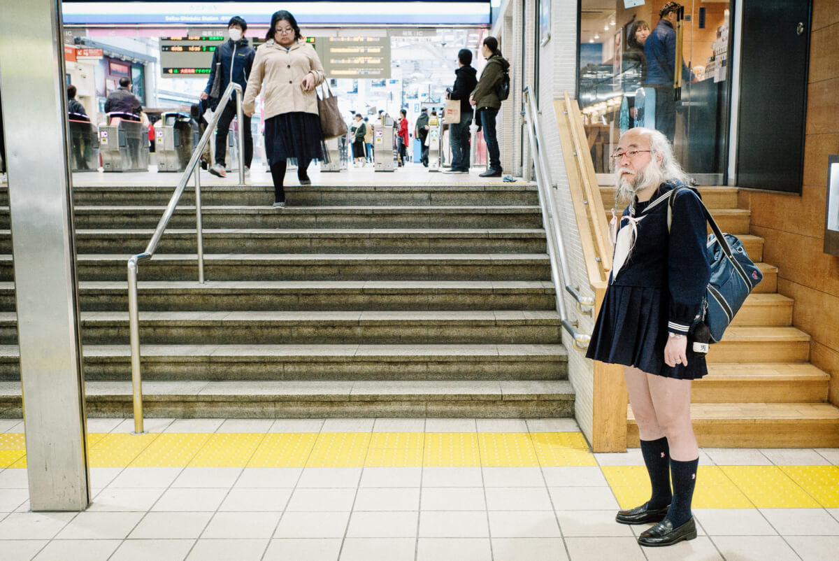 bearded japanese man wearing schoolgirl sailor suit uniform