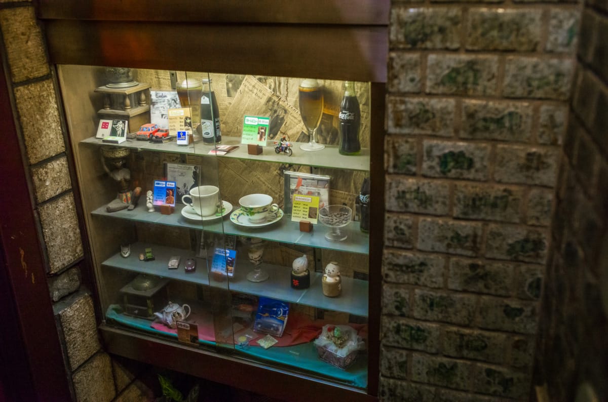 The dated colours and decor of an old Tokyo coffee shop