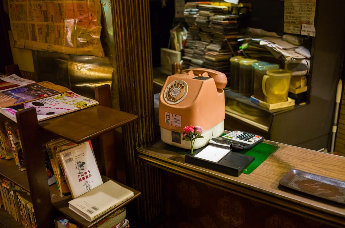 The dated colours and decor of an old Tokyo coffee shop