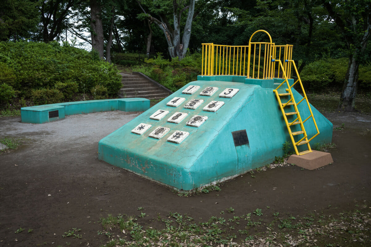 concrete and retro push-button phone slide