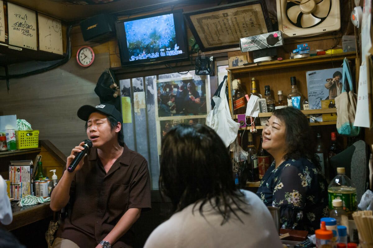 singing in a cluttered little Tokyo bar