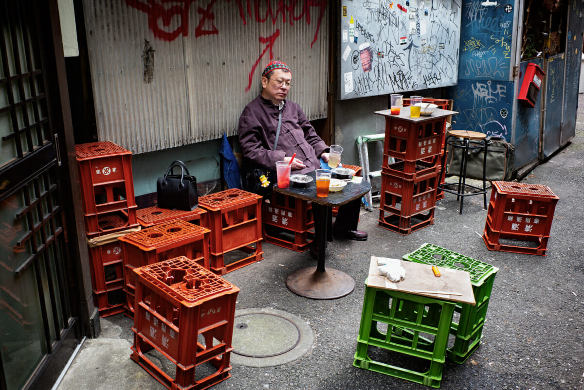 dejected looking Tokyo drinker