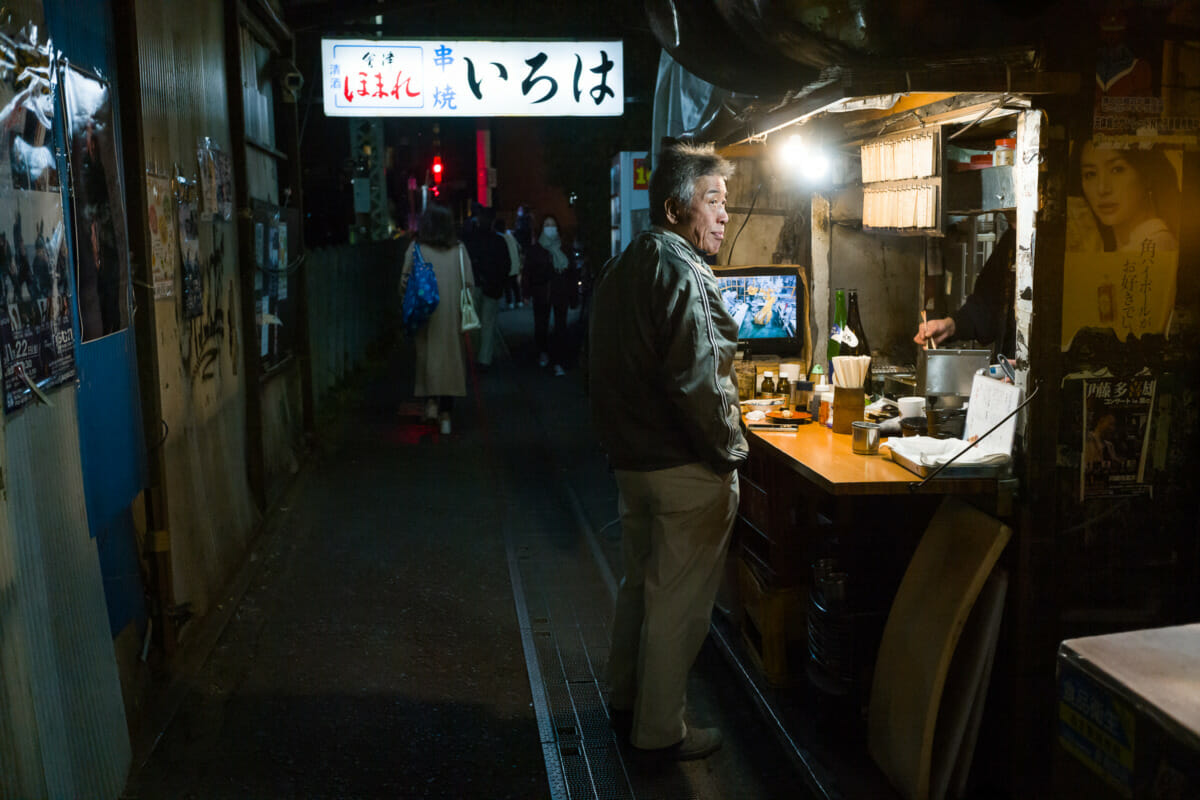 a dystopian Japanese drinking alleyway