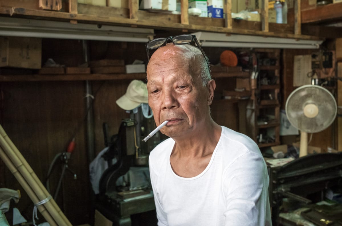 An octogenarian in his dated little Tokyo workshop