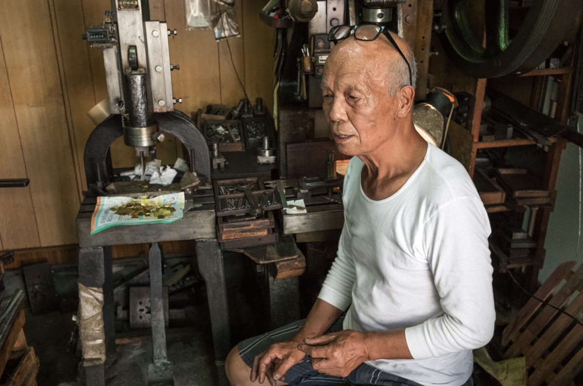 An octogenarian in his dated little Tokyo workshop