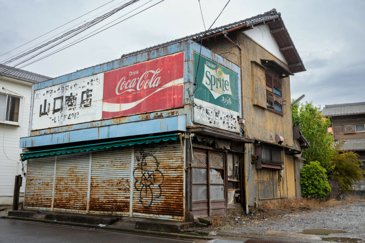 faded Tokyo Coca-Cola and Sprite signs