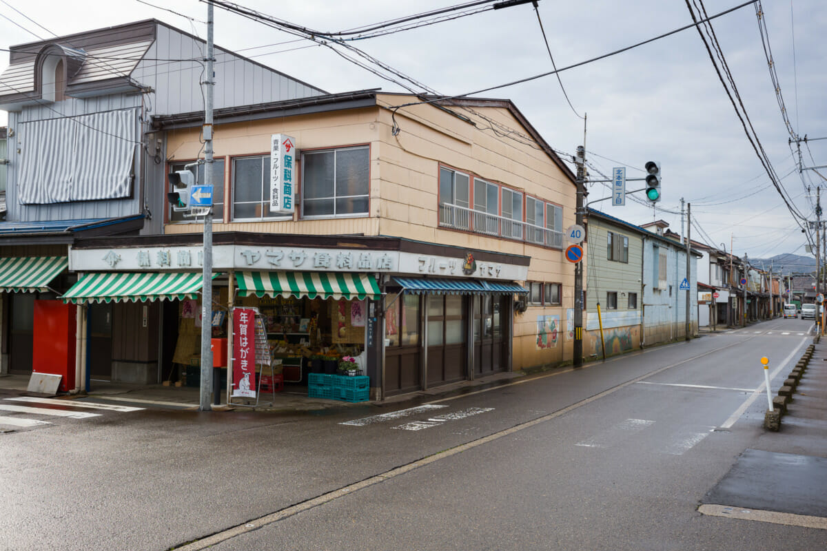 The faded traditional shop fronts of an old Japanese town