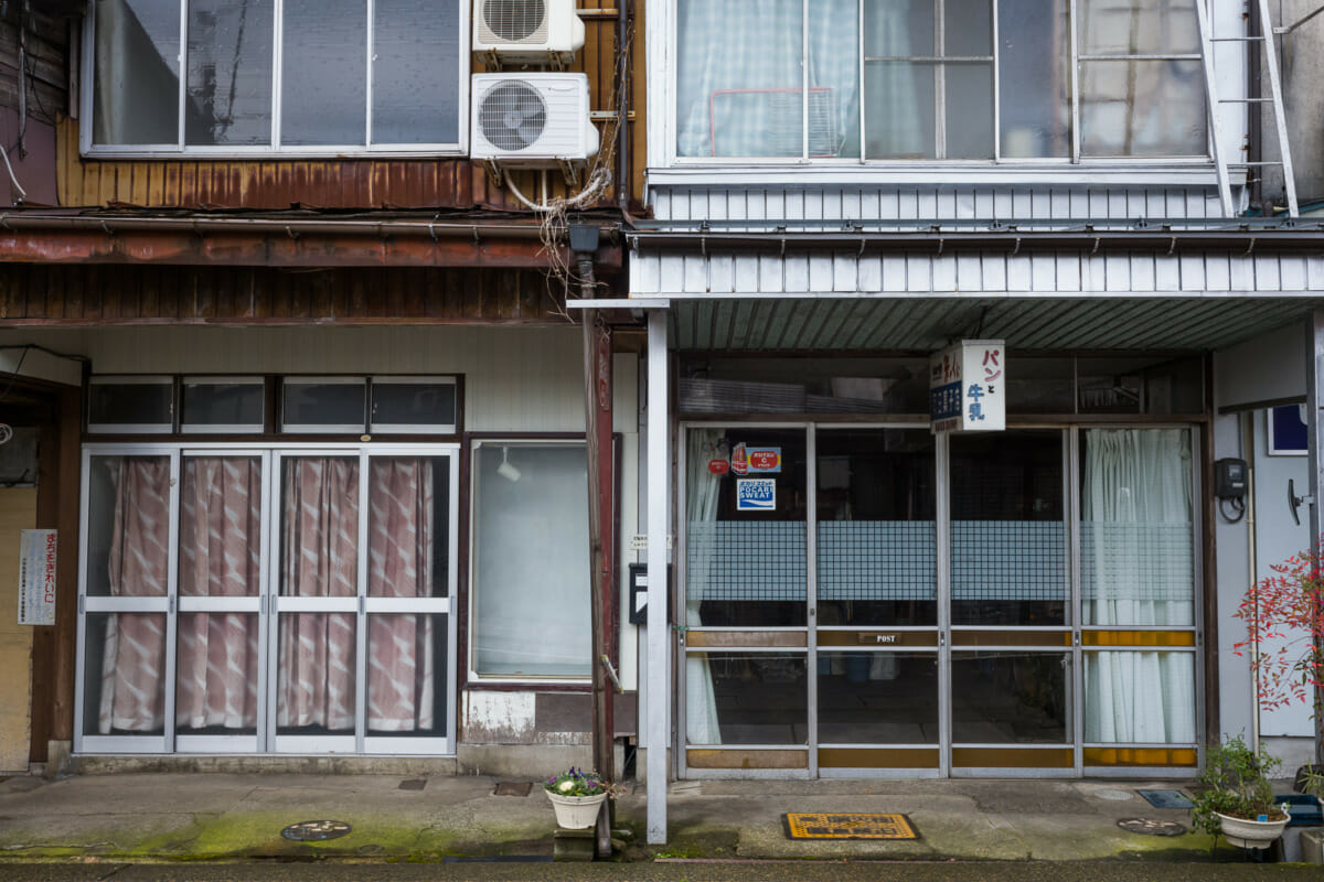 The faded traditional shop fronts of an old Japanese town