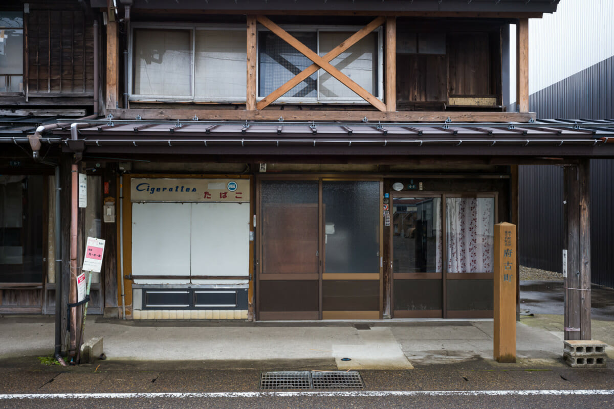 The faded traditional shop fronts of an old Japanese town