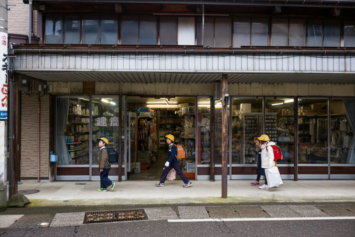 The faded traditional shop fronts of an old Japanese town