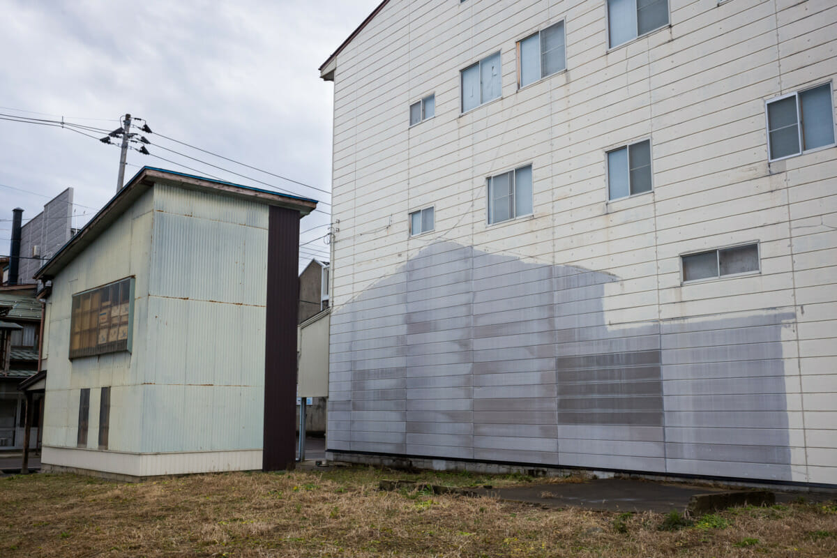 The faded traditional shop fronts of an old Japanese town