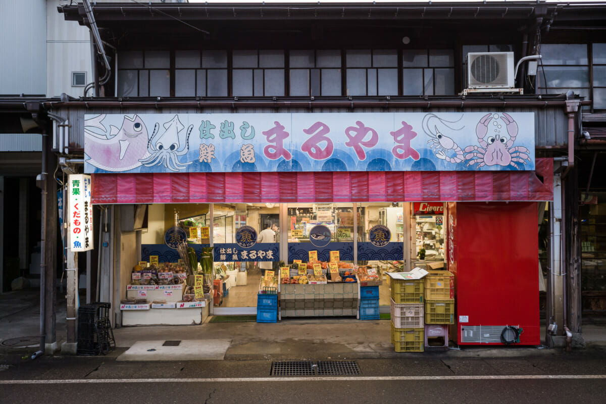 The faded traditional shop fronts of an old Japanese town