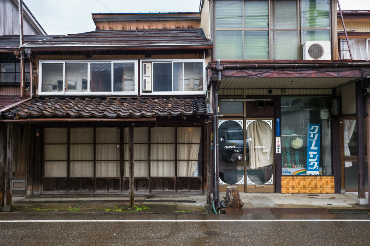 The faded traditional shop fronts of an old Japanese town