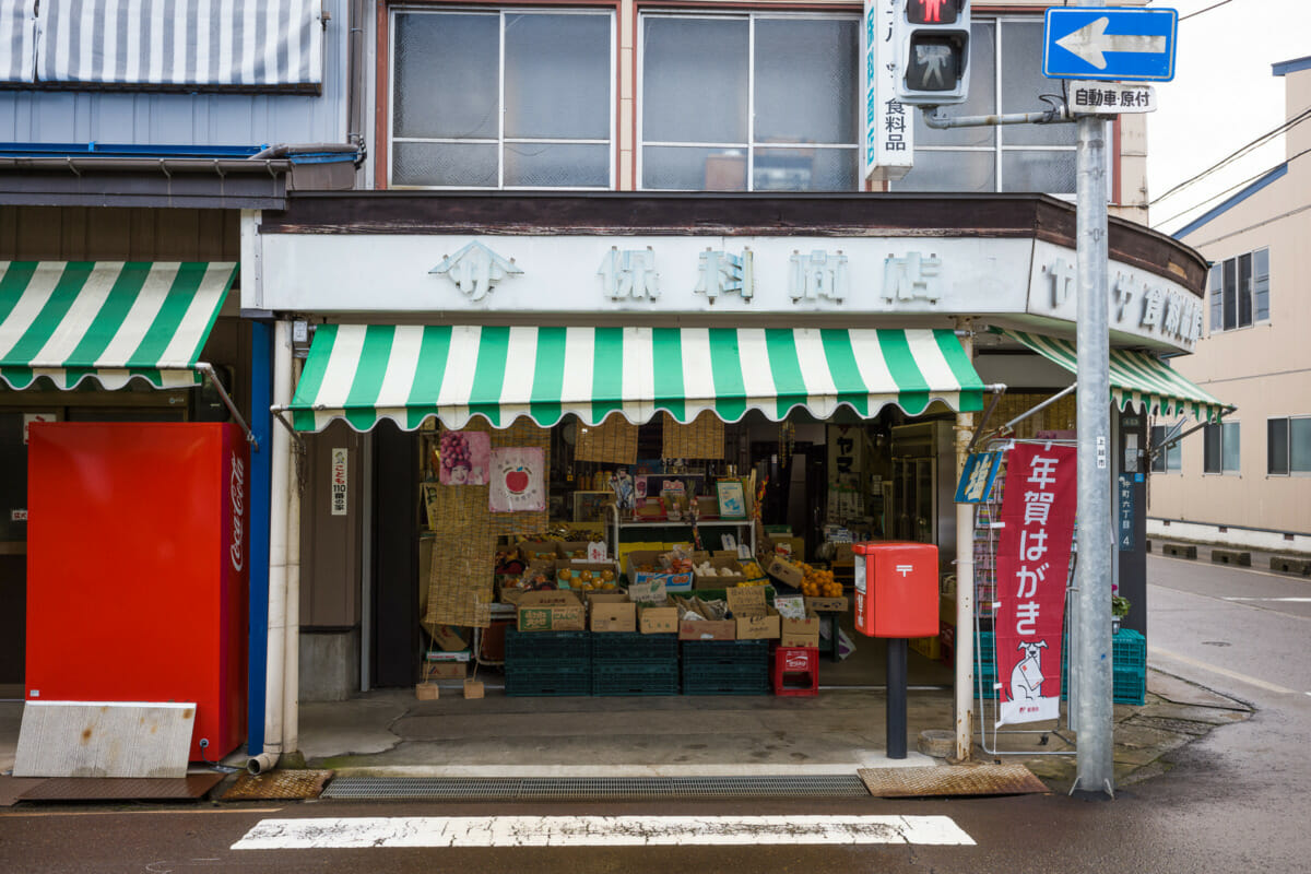 The faded traditional shop fronts of an old Japanese town