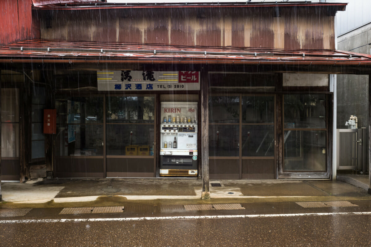 The faded traditional shop fronts of an old Japanese town