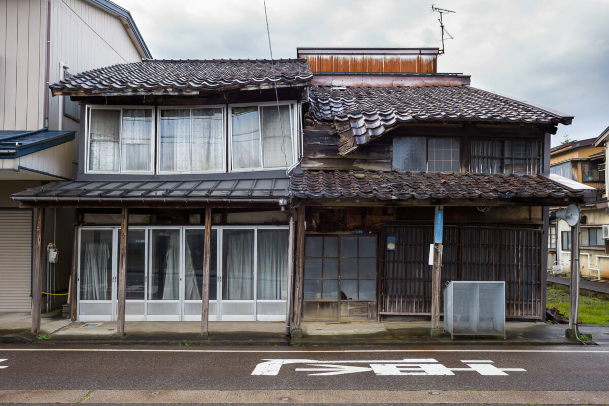 The faded traditional shop fronts of an old Japanese town