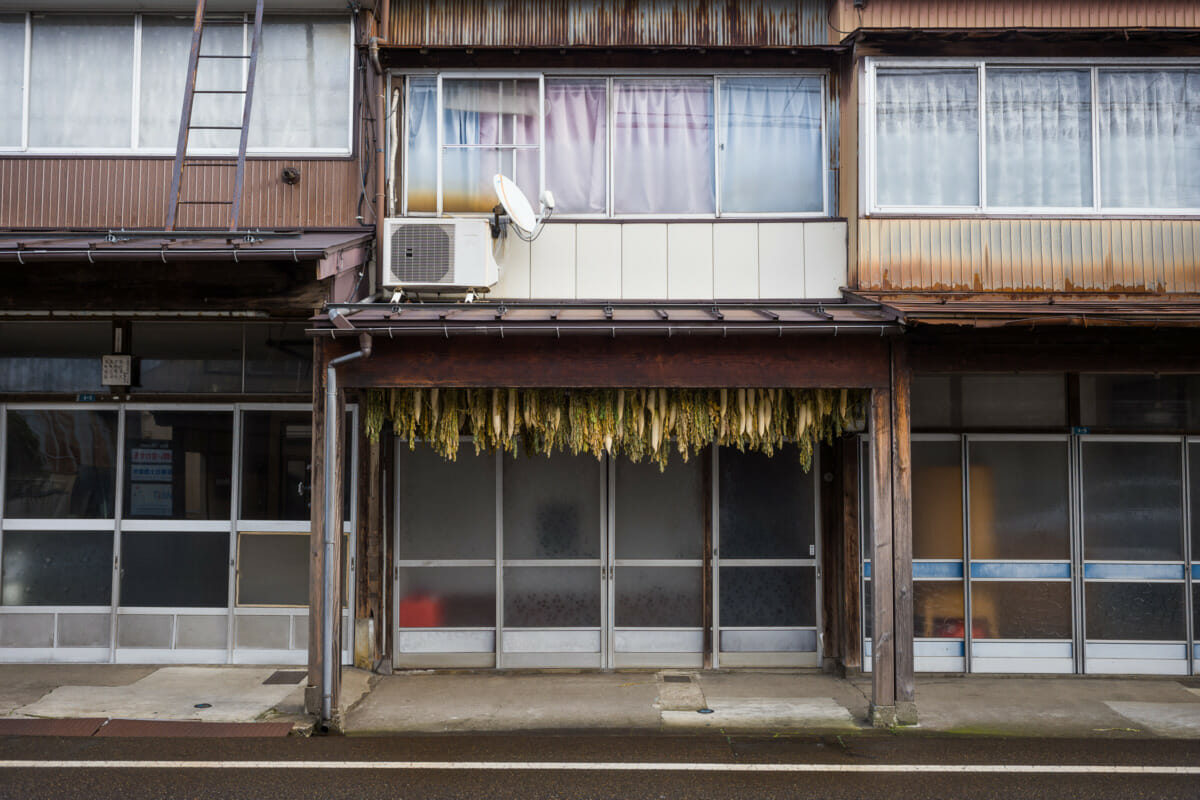 The faded traditional shop fronts of an old Japanese town