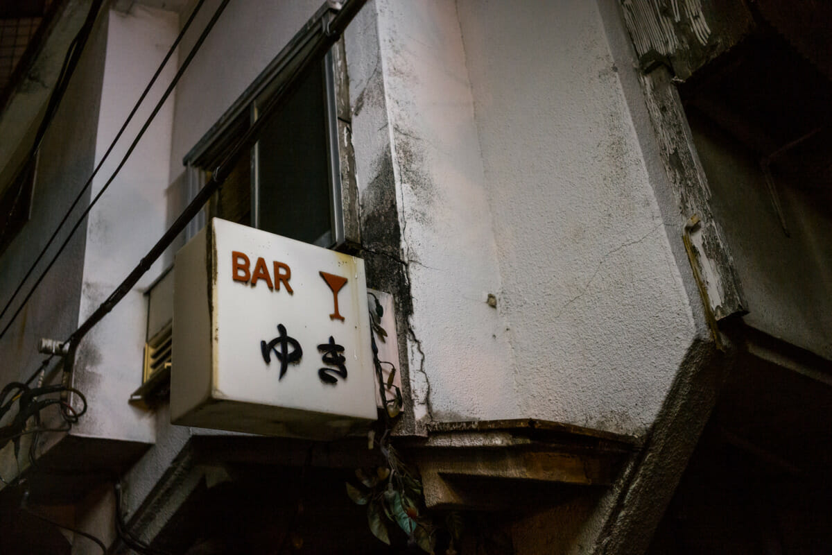 Crumbling and graffiti covered Tokyo alleyways