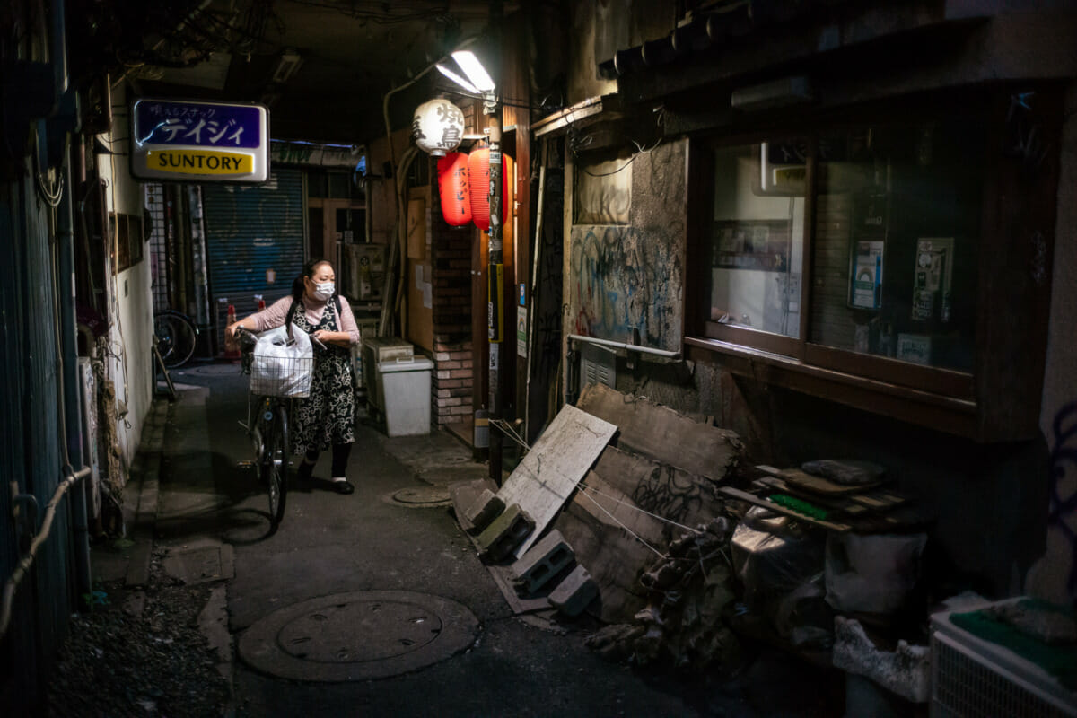 Crumbling and graffiti covered Tokyo alleyways