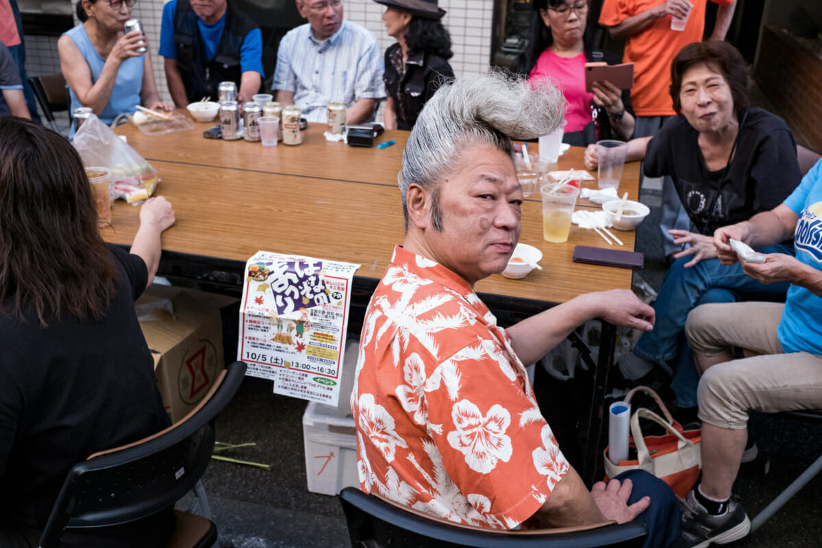 japanese man in tokyo with a huge quiff