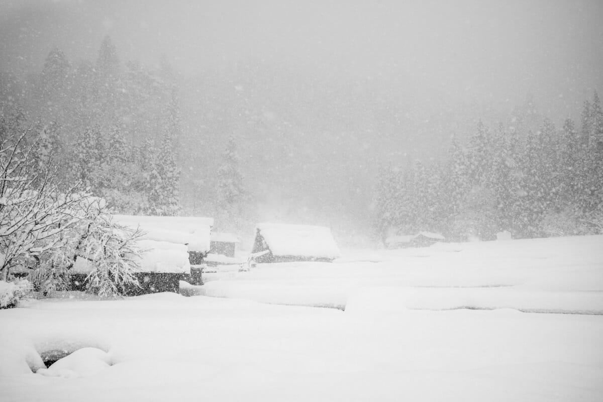 a beautifully bleak Japanese village in the snow