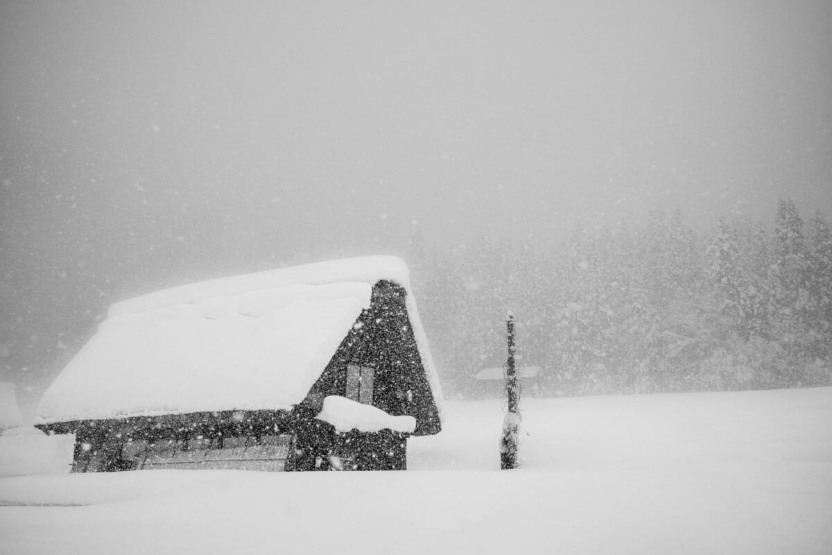 a beautifully bleak Japanese village in the snow