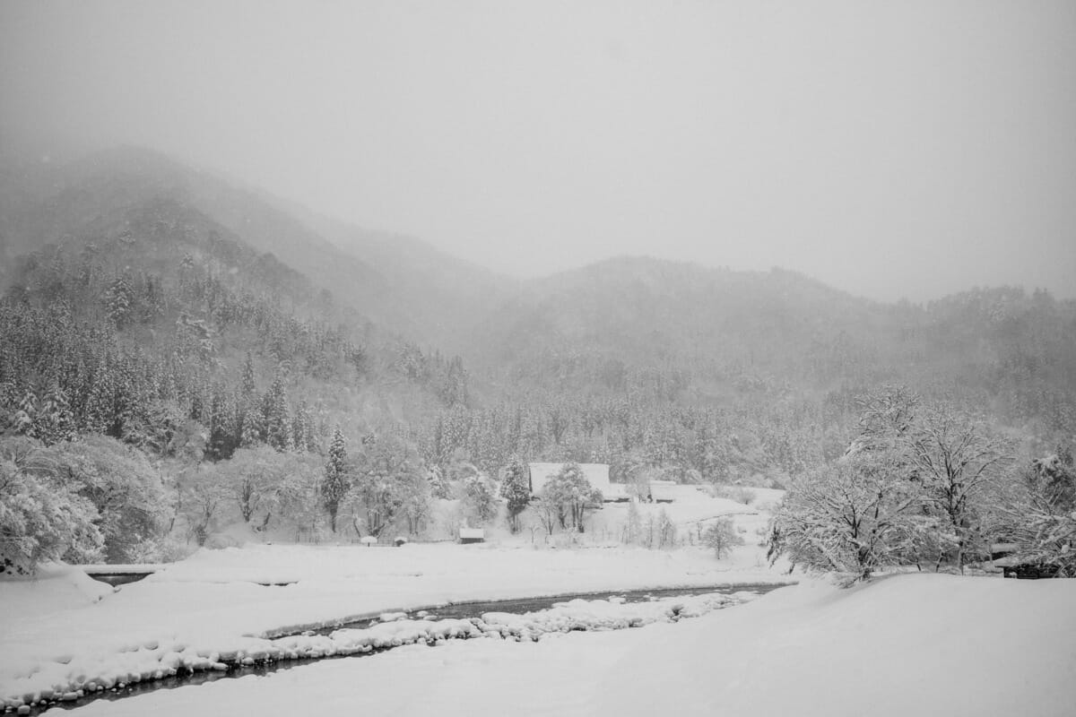 a beautifully bleak Japanese village in the snow