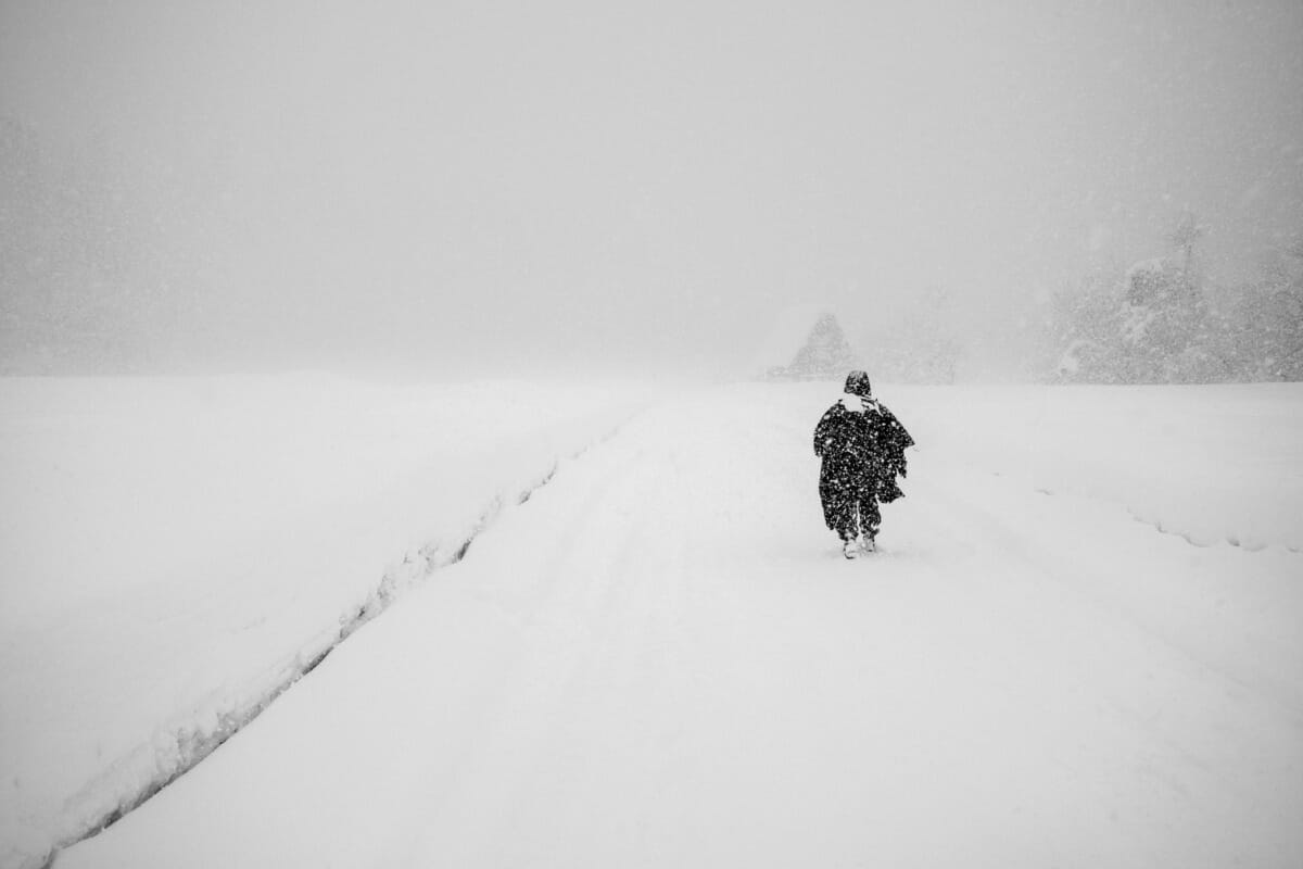 a beautifully bleak Japanese village in the snow