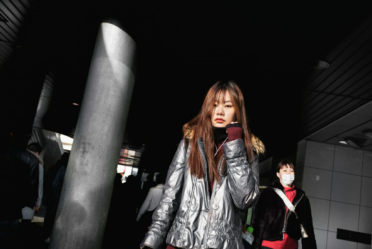 Japanese woman in silver in the shadows