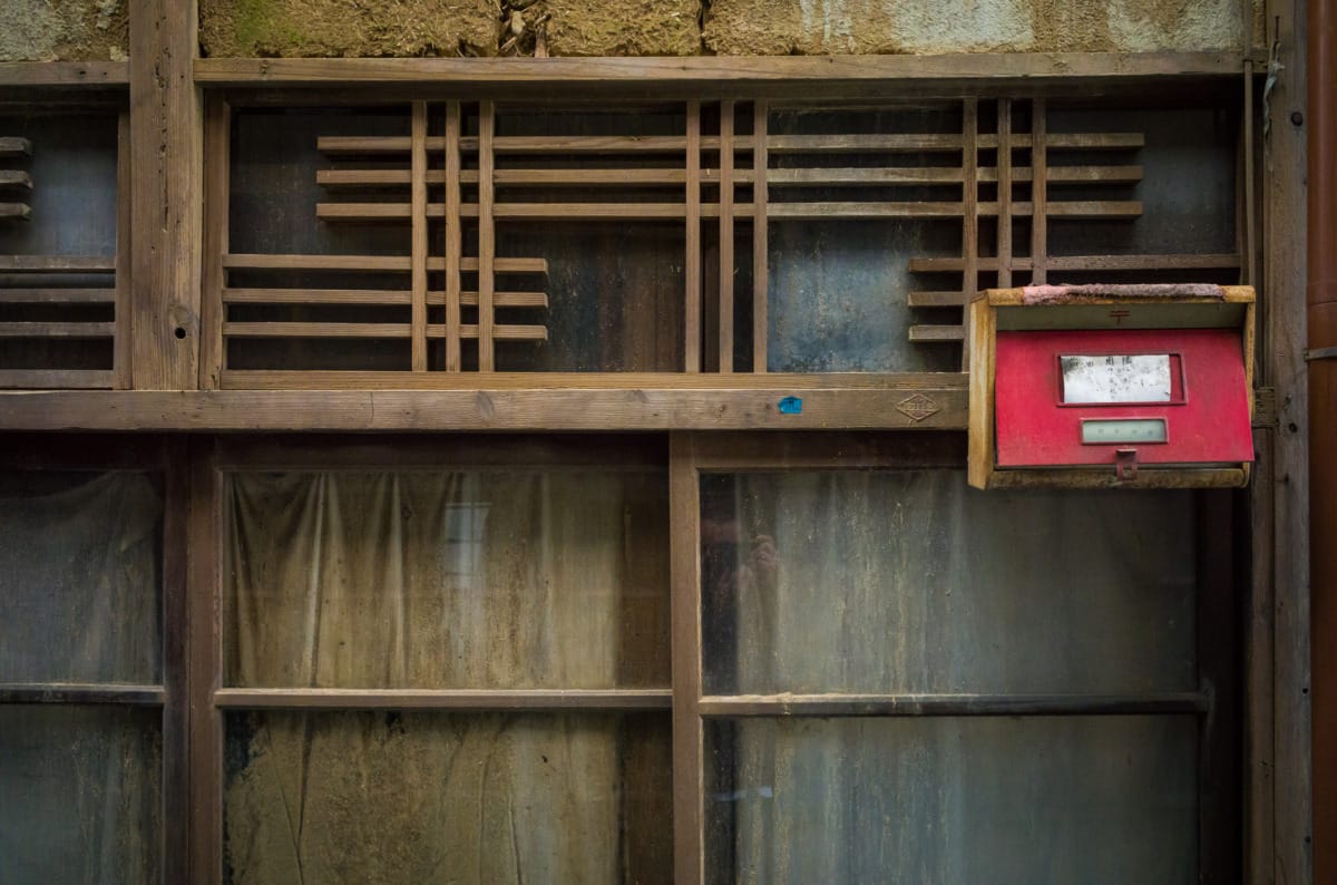 The overgrown beauty of a long abandoned Japanese shopping arcade