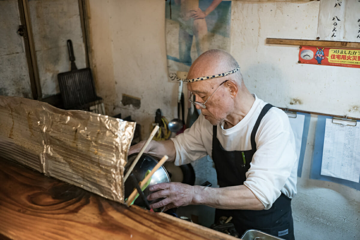 A lovely old Tokyo bar owner