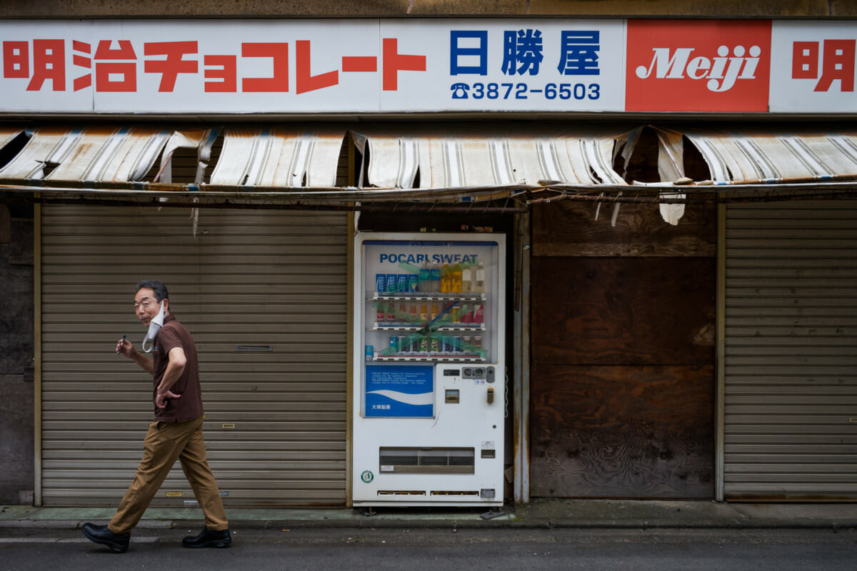 old and broken Japanese vending machines