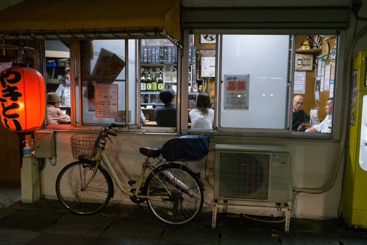 inside and outside an old Japanese yakitori bar