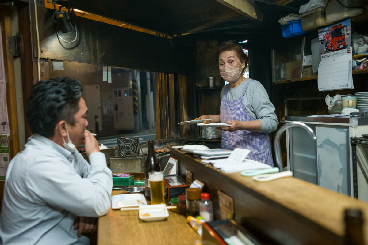 inside and outside an old Japanese yakitori bar