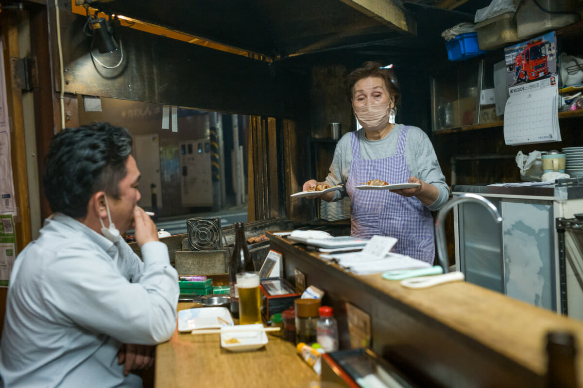 inside and outside an old Japanese yakitori bar