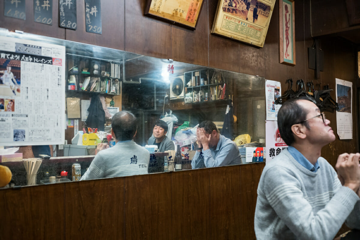 an old cluttered and interesting little Tokyo bar