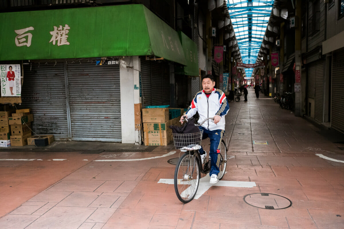 Old Tokyo shopping street shutters and stripes