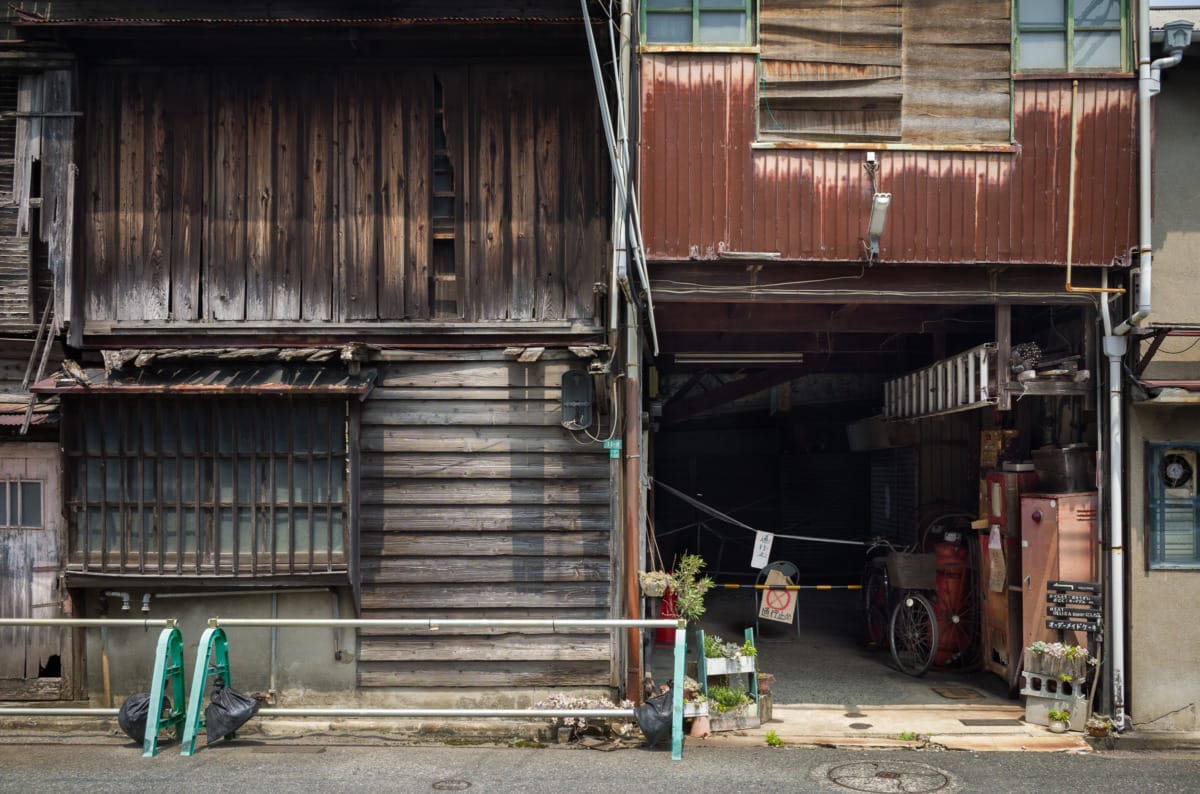 dilapidated pre-war and wooden Japanese shopping street