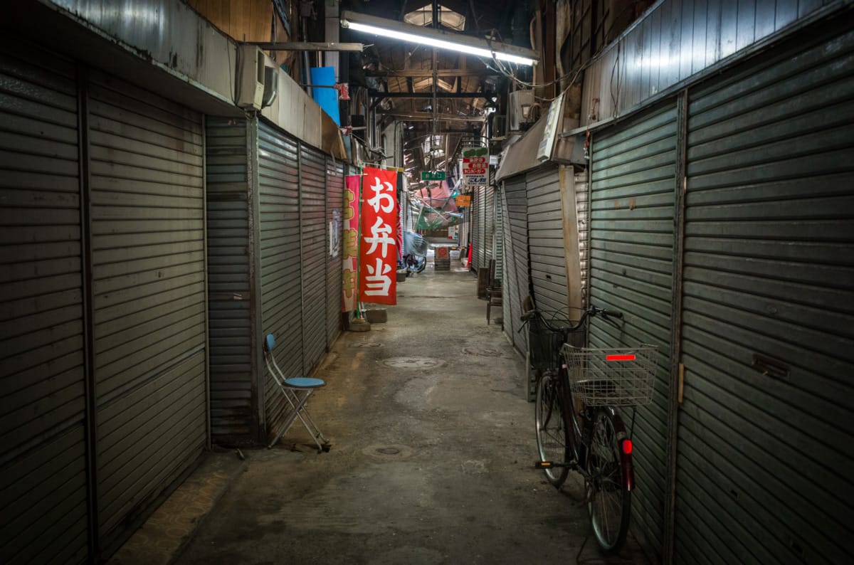 dilapidated pre-war and wooden Japanese shopping street