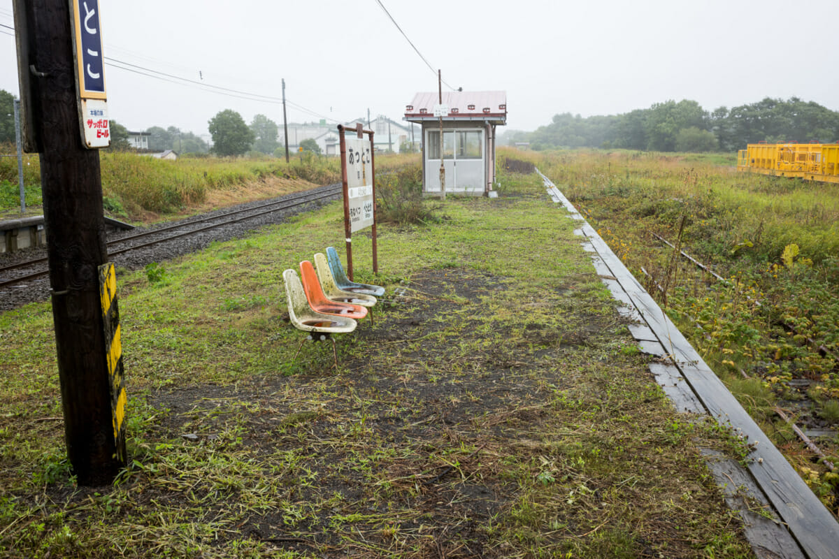 a sad but beautiful abandoned Japanese train platform