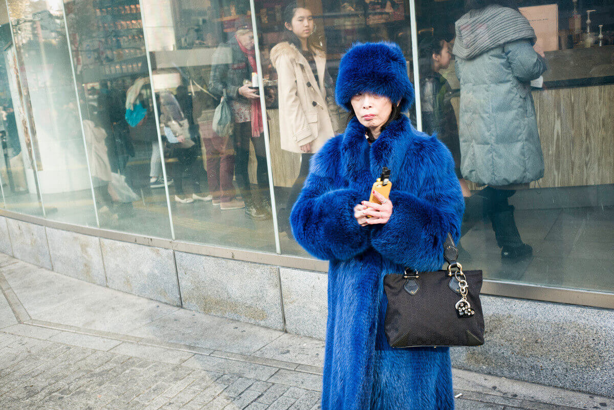 Striking Japanese woman in blue fur