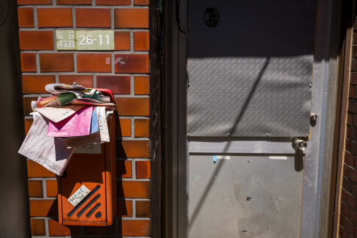 packed Tokyo post boxes