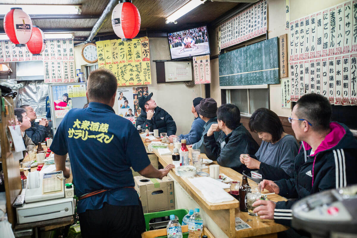 Sumo and beer in a Tokyo bar